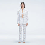 Nola White Long Sleeve Cotton Shirt | Moeva | | Each week unveils new pieces—luxury swimwear, fluid resort silhouettes, and elevated summer-to-evening essentials designed to carry you from coastal escapes to city nights.