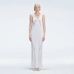 Odessa Silver V Neck Knit Maxi Dress | Moeva | | Each week unveils new pieces—luxury swimwear, fluid resort silhouettes, and elevated summer-to-evening essentials designed to carry you from coastal escapes to city nights.