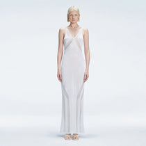 Odessa Silver V Neck Knit Maxi Dress | Moeva | | Each week unveils new pieces—luxury swimwear, fluid resort silhouettes, and elevated summer-to-evening essentials designed to carry you from coastal escapes to city nights.