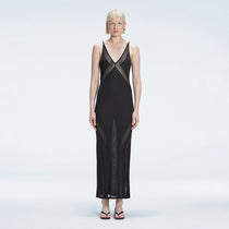 Odessa Black V Neck Knit Maxi Dress | Moeva | Dress | Each week unveils new pieces—luxury swimwear, fluid resort silhouettes, and elevated summer-to-evening essentials designed to carry you from coastal escapes to city nights.