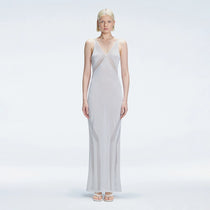 Odessa Silver V Neck Knit Maxi Dress | Moeva | Dress | Each week unveils new pieces—luxury swimwear, fluid resort silhouettes, and elevated summer-to-evening essentials designed to carry you from coastal escapes to city nights.