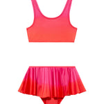 Peachy Red/Pink Kids Bikini Top laid flat, displaying the striking red-pink print and scoop neck design.
