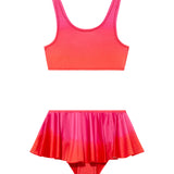 Peachy Red/Pink Kids Bikini Bottom laid flat, showcasing the full bottom coverage and charming frilled skirt.
