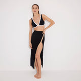 Pina Black/White Asymmetric Gold Button Maxi Skirt | Moeva | Beachwear Skirts | Each week unveils new pieces—luxury swimwear, fluid resort silhouettes, and elevated summer-to-evening essentials designed to carry you from coastal escapes to city nights.