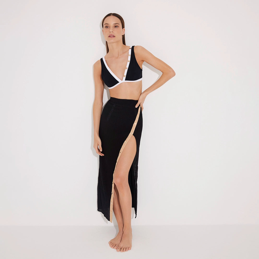 Pina Black/White Asymmetric Gold Button Maxi Skirt | Moeva | Beachwear Skirts | Each week unveils new pieces—luxury swimwear, fluid resort silhouettes, and elevated summer-to-evening essentials designed to carry you from coastal escapes to city nights.