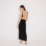 Pina Black/White Asymmetric Gold Button Maxi Skirt | Moeva | Beachwear Skirts | Each week unveils new pieces—luxury swimwear, fluid resort silhouettes, and elevated summer-to-evening essentials designed to carry you from coastal escapes to city nights.