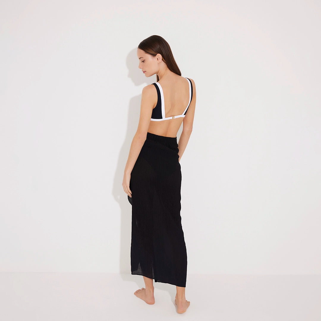 Pina Black/White Asymmetric Gold Button Maxi Skirt | Moeva | Beachwear Skirts | Each week unveils new pieces—luxury swimwear, fluid resort silhouettes, and elevated summer-to-evening essentials designed to carry you from coastal escapes to city nights.