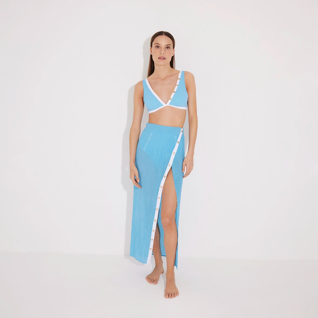 Pina Blue/White Asymmetric Gold Button Maxi Skirt | Moeva | Beachwear Skirts | Each week unveils new pieces—luxury swimwear, fluid resort silhouettes, and elevated summer-to-evening essentials designed to carry you from coastal escapes to city nights.