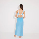 Pina Blue/White Asymmetric Gold Button Maxi Skirt | Moeva | Beachwear Skirts | Each week unveils new pieces—luxury swimwear, fluid resort silhouettes, and elevated summer-to-evening essentials designed to carry you from coastal escapes to city nights.