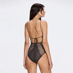 Provence Halter Neck Knitted Black Swimsuit | Moeva | Swimsuit | Each week unveils new pieces—luxury swimwear, fluid resort silhouettes, and elevated summer-to-evening essentials designed to carry you from coastal escapes to city nights.