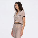 Ramatuelle Knitted Shirt-Style Gold Buttoned Grey-Black Crop Top | Moeva | Crop Top | Each week unveils new pieces—luxury swimwear, fluid resort silhouettes, and elevated summer-to-evening essentials designed to carry you from coastal escapes to city nights.