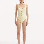Reva Yellow Scoop Neck Textured Swimsuit | Moeva | Swimsuit | Each week unveils new pieces—luxury swimwear, fluid resort silhouettes, and elevated summer-to-evening essentials designed to carry you from coastal escapes to city nights.
