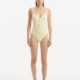 Reva Yellow Scoop Neck Textured Swimsuit | Moeva | Swimsuit | Each week unveils new pieces—luxury swimwear, fluid resort silhouettes, and elevated summer-to-evening essentials designed to carry you from coastal escapes to city nights.