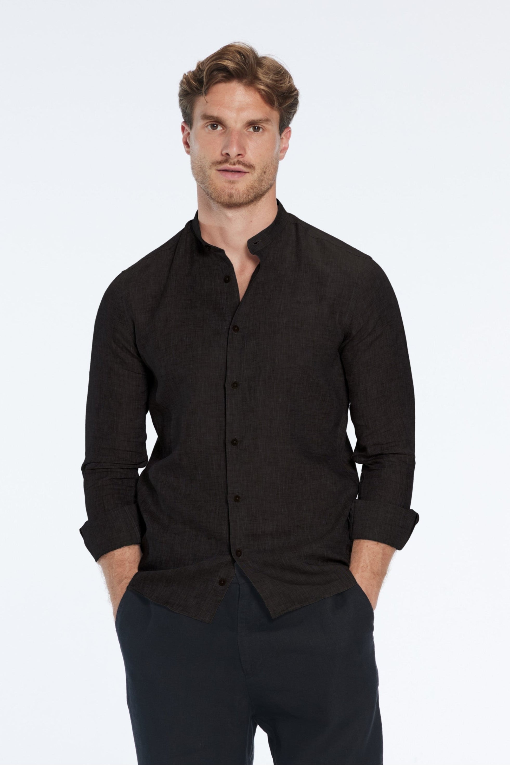 Ryan Black Linen Shirt with Grandad Collar | Moeva | Men Mandarin Collar Shirts | Each week unveils new pieces—luxury swimwear, fluid resort silhouettes, and elevated summer-to-evening essentials designed to carry you from coastal escapes to city nights.
