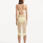 "Back view of the Raiden Yellow Pareo, illustrating the elegant drape and vibrant yellow hue."