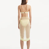 "Back view of the Raiden Yellow Pareo, illustrating the elegant drape and vibrant yellow hue."