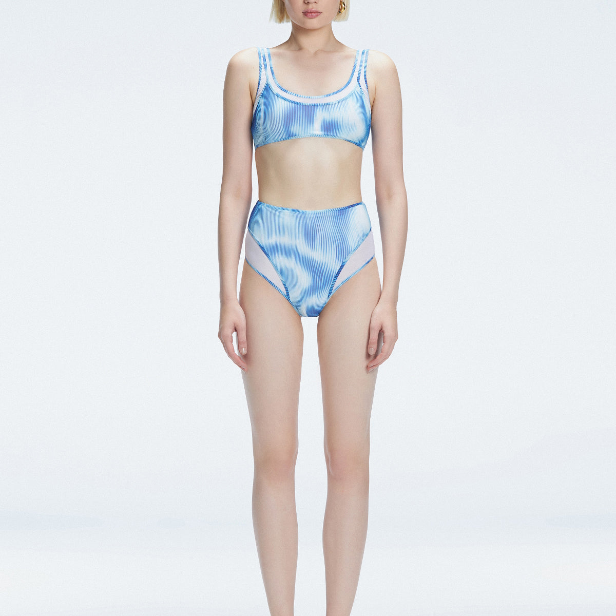 Rosalind Blue Optical Scoop Neck 3D Print Bikini Top | Moeva | Bikini Top | Each week unveils new pieces—luxury swimwear, fluid resort silhouettes, and elevated summer-to-evening essentials designed to carry you from coastal escapes to city nights.