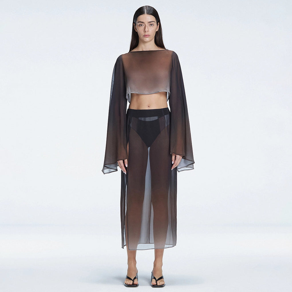 Tabitha Black Optical Maxi Skirt | Moeva | Skirt | Each week unveils new pieces—luxury swimwear, fluid resort silhouettes, and elevated summer-to-evening essentials designed to carry you from coastal escapes to city nights.