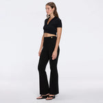 Shandy Polo Collar Knitted Crop Top And Colette Black Pants Set | Moeva | RTW Bustiers | Each week unveils new pieces—luxury swimwear, fluid resort silhouettes, and elevated summer-to-evening essentials designed to carry you from coastal escapes to city nights.