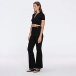 Shandy Black Polo Collar Knitted Crop Top | Moeva | RTW Bustiers | Each week unveils new pieces—luxury swimwear, fluid resort silhouettes, and elevated summer-to-evening essentials designed to carry you from coastal escapes to city nights.