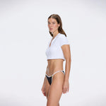 Shandy White Polo Collar Knitted Crop Top | Moeva | RTW Bustiers | Each week unveils new pieces—luxury swimwear, fluid resort silhouettes, and elevated summer-to-evening essentials designed to carry you from coastal escapes to city nights.