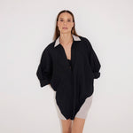Sibilla Black Long Sleeve Oversized Linen Shirt | Moeva | Shirt | Each week unveils new pieces—luxury swimwear, fluid resort silhouettes, and elevated summer-to-evening essentials designed to carry you from coastal escapes to city nights.