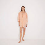 Sibilla Orange Long Sleeve Oversized Linen Shirt | Moeva | Shirt | Each week unveils new pieces—luxury swimwear, fluid resort silhouettes, and elevated summer-to-evening essentials designed to carry you from coastal escapes to city nights.