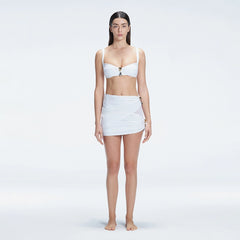 Siena White Mesh Detail Mini Skirt | Moeva | Beachwear Skirts | Each week unveils new pieces—luxury swimwear, fluid resort silhouettes, and elevated summer-to-evening essentials designed to carry you from coastal escapes to city nights.