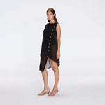 Solianne Black Sheer Sleeveless Asymmetric Dress with Gold Button Detail | Moeva | Beachwear Dresses | Each week unveils new pieces—luxury swimwear, fluid resort silhouettes, and elevated summer-to-evening essentials designed to carry you from coastal escapes to city nights.