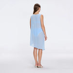 Solianne Blue Sheer Sleeveless Asymmetric Dress with Gold Button Detail | Moeva | Beachwear Dresses | Each week unveils new pieces—luxury swimwear, fluid resort silhouettes, and elevated summer-to-evening essentials designed to carry you from coastal escapes to city nights.