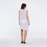 Solianne White Sheer Sleeveless Asymmetric Dress with Gold Button Detail | Moeva | Beachwear Dresses | Each week unveils new pieces—luxury swimwear, fluid resort silhouettes, and elevated summer-to-evening essentials designed to carry you from coastal escapes to city nights.