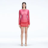 Sylvie Pink Optical Long Sleeve Mini Dress | Moeva | Beachwear Dresses | Each week unveils new pieces—luxury swimwear, fluid resort silhouettes, and elevated summer-to-evening essentials designed to carry you from coastal escapes to city nights.