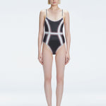 Front view of model wearing Seraphina Black Optical One Piece with scoop neck and boned torso for support.
