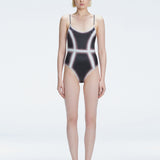 Front view of model wearing Seraphina Black Optical One Piece with scoop neck and boned torso for support.
