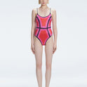 Front view of model wearing Seraphina Red Optical One Piece with scoop neck and boned torso for support.
