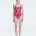 Front view of model wearing Seraphina Red Optical One Piece with scoop neck and boned torso for support.
