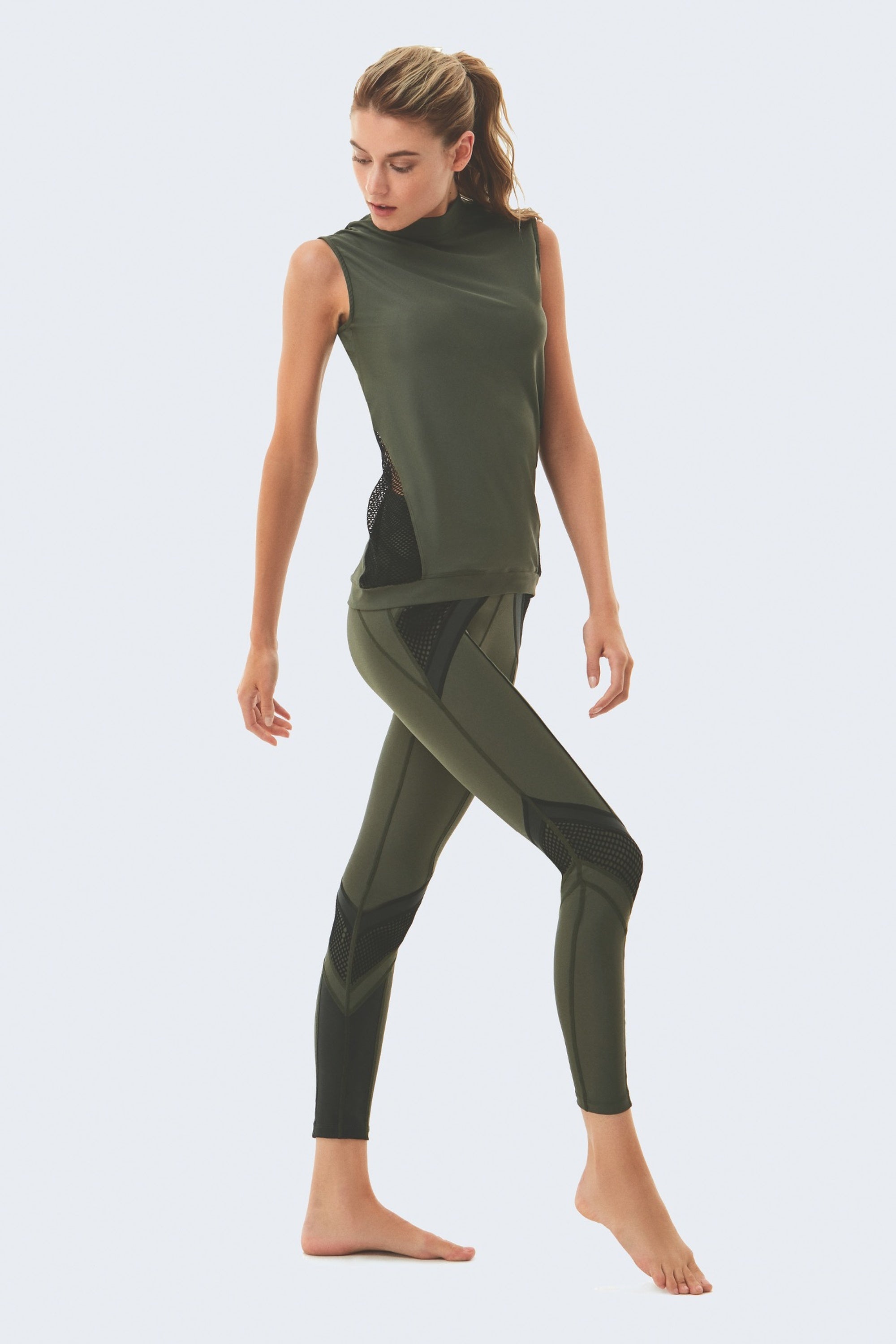 Sienna Green Top | Moeva | Sports Tops | Each week unveils new pieces—luxury swimwear, fluid resort silhouettes, and elevated summer-to-evening essentials designed to carry you from coastal escapes to city nights.