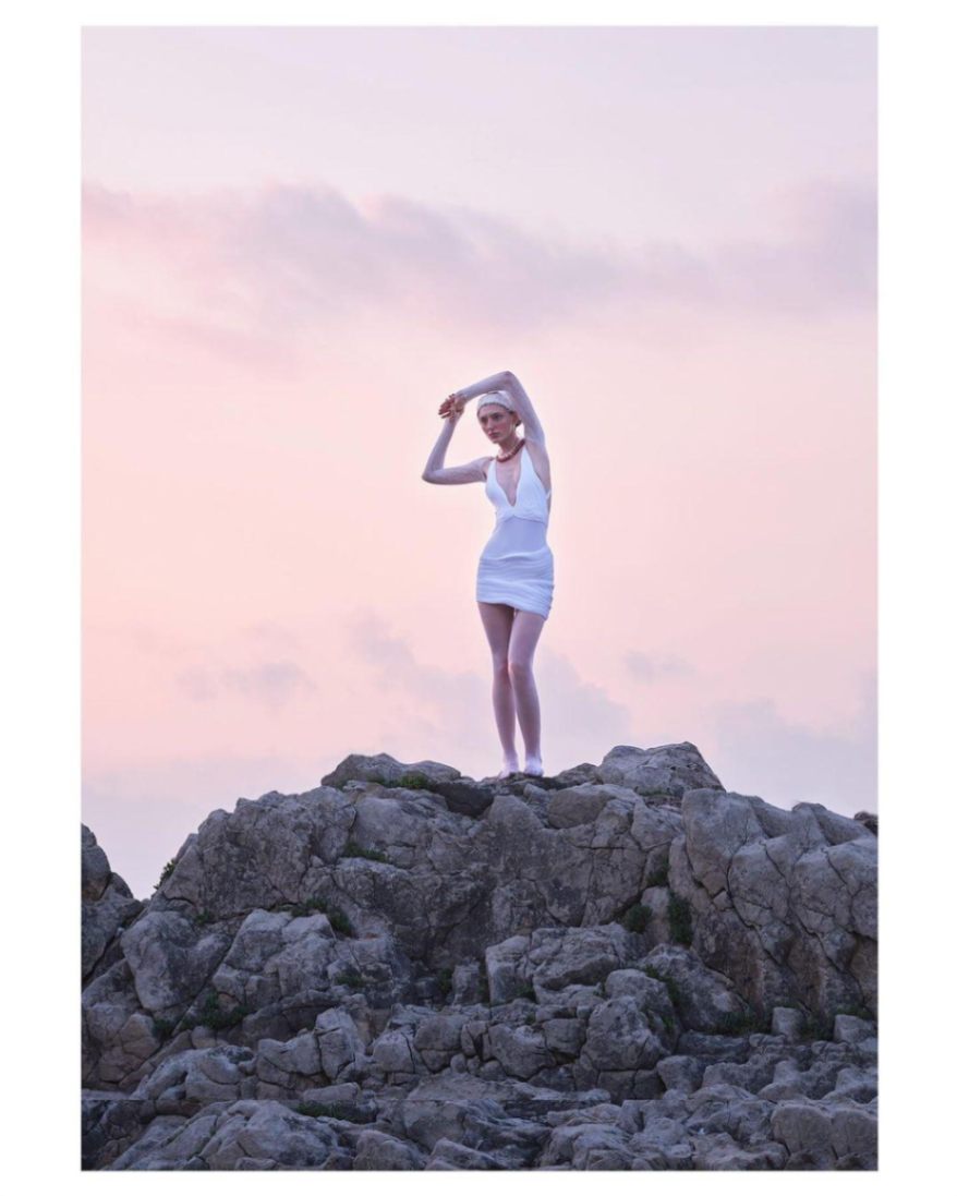 Front view of the Breena Swimsuit and Ephram Skirt combination, styled for a polished summer look.
