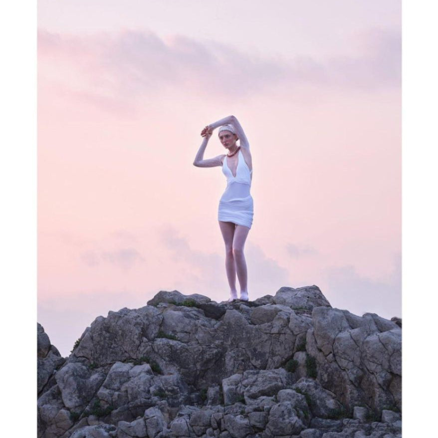 Sober Magazine - Breena White V Neck Swimsuit - Ephram White Wave-Textured Mini Skirt | Moeva | Swimsuit | Each week unveils new pieces—luxury swimwear, fluid resort silhouettes, and elevated summer-to-evening essentials designed to carry you from coastal escapes to city nights.
