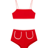 Sunny Red Kids Bikini Bottom laid flat, highlighting the vibrant red color and practical pocket design.
