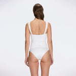 Talia V Neck with Gold Detail Satin White Swimsuit | Moeva | Swimsuit | Each week unveils new pieces—luxury swimwear, fluid resort silhouettes, and elevated summer-to-evening essentials designed to carry you from coastal escapes to city nights.