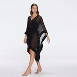 Tata Black Sheer Gold Buttoned Belted Kaftan with Asymmetric Hem | Moeva | Kaftans | Each week unveils new pieces—luxury swimwear, fluid resort silhouettes, and elevated summer-to-evening essentials designed to carry you from coastal escapes to city nights.