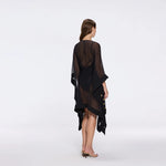 Tata Black Sheer Gold Buttoned Belted Kaftan with Asymmetric Hem | Moeva | Kaftans | Each week unveils new pieces—luxury swimwear, fluid resort silhouettes, and elevated summer-to-evening essentials designed to carry you from coastal escapes to city nights.