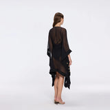 Tata Black Sheer Gold Buttoned Belted Kaftan with Asymmetric Hem | Moeva | Kaftans | Each week unveils new pieces—luxury swimwear, fluid resort silhouettes, and elevated summer-to-evening essentials designed to carry you from coastal escapes to city nights.