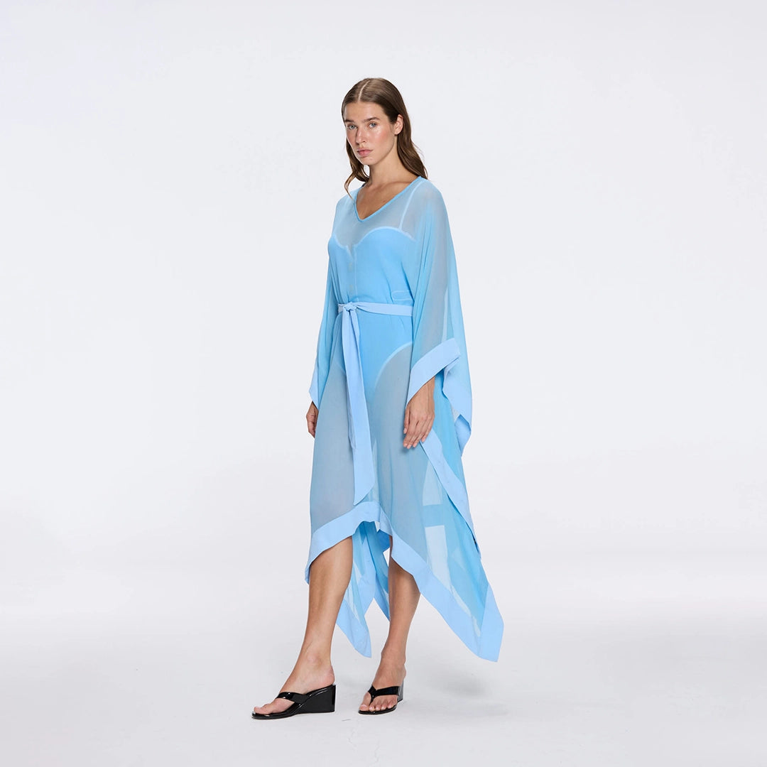 Tata Blue Sheer Gold Buttoned Belted Kaftan with Asymmetric Hem | Moeva | Kaftans | Each week unveils new pieces—luxury swimwear, fluid resort silhouettes, and elevated summer-to-evening essentials designed to carry you from coastal escapes to city nights.