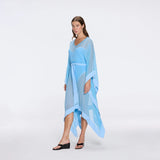 Tata Blue Sheer Gold Buttoned Belted Kaftan with Asymmetric Hem | Moeva | Kaftans | Each week unveils new pieces—luxury swimwear, fluid resort silhouettes, and elevated summer-to-evening essentials designed to carry you from coastal escapes to city nights.