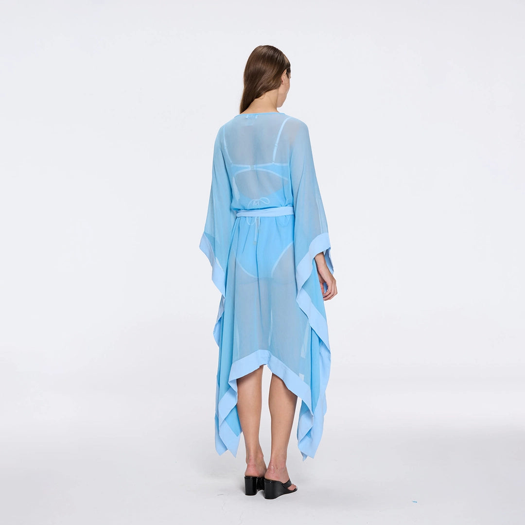 Tata Blue Sheer Gold Buttoned Belted Kaftan with Asymmetric Hem | Moeva | Kaftans | Each week unveils new pieces—luxury swimwear, fluid resort silhouettes, and elevated summer-to-evening essentials designed to carry you from coastal escapes to city nights.