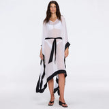Tata White-Black Sheer Gold Buttoned Belted Kaftan with Asymmetric Hem | Moeva | Kaftans | Each week unveils new pieces—luxury swimwear, fluid resort silhouettes, and elevated summer-to-evening essentials designed to carry you from coastal escapes to city nights.