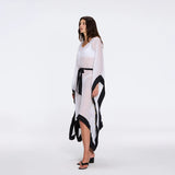 Tata White-Black Sheer Gold Buttoned Belted Kaftan with Asymmetric Hem | Moeva | Kaftans | Each week unveils new pieces—luxury swimwear, fluid resort silhouettes, and elevated summer-to-evening essentials designed to carry you from coastal escapes to city nights.