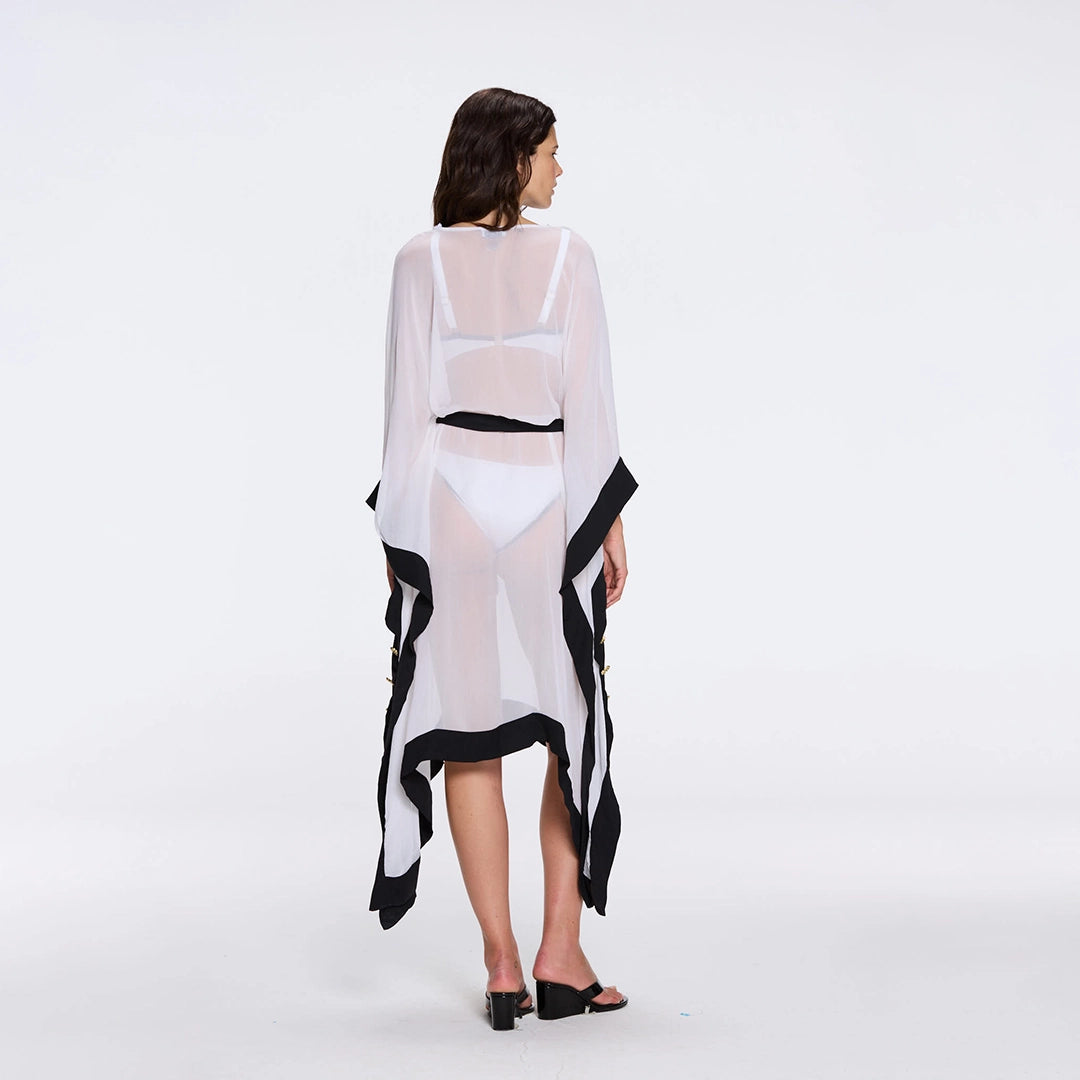 Tata White-Black Sheer Gold Buttoned Belted Kaftan with Asymmetric Hem | Moeva | Kaftans | Each week unveils new pieces—luxury swimwear, fluid resort silhouettes, and elevated summer-to-evening essentials designed to carry you from coastal escapes to city nights.